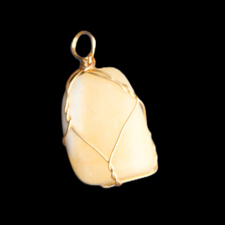 Yellow Calcite wire wrapped pendant 19*14*22mm 10g in sunlight - Rocks and Things Store