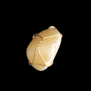 Yellow Calcite wire wrapped pendant 19*14*22mm 10g in sunlight - Rocks and Things Store