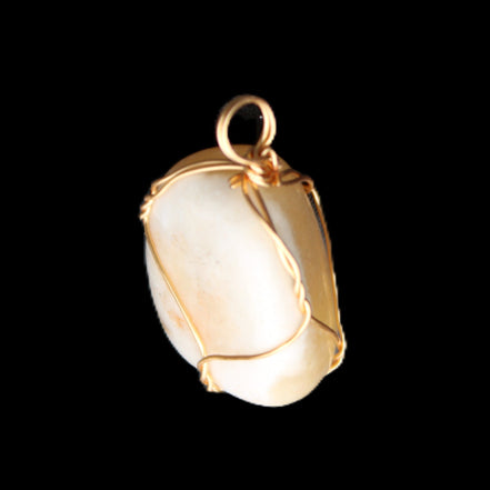 Yellow Calcite wire wrapped pendant 19*14*22mm 10g in sunlight - Rocks and Things Store