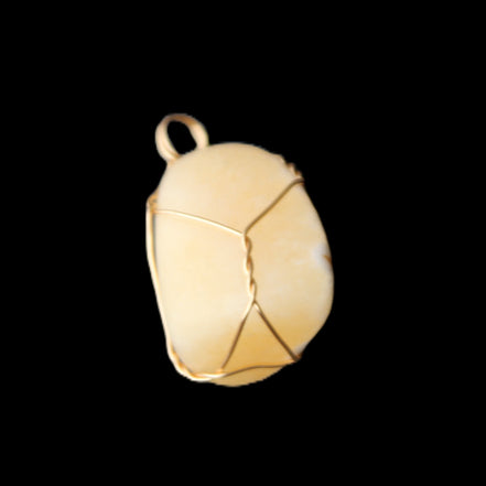Yellow Calcite wire wrapped pendant 19*14*22mm 10g in sunlight - Rocks and Things Store