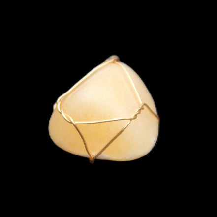 Yellow Calcite wire wrapped pendant 19*14*22mm 10g in sunlight - Rocks and Things Store