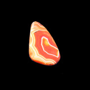 Crazy Lace Agate from Madagascar 36*23*6mm 11g in sunlight - Rocks and Things Store