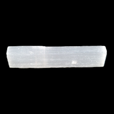 Selenite rod 55mm 7/9g in sunlight - Rocks and Things Store