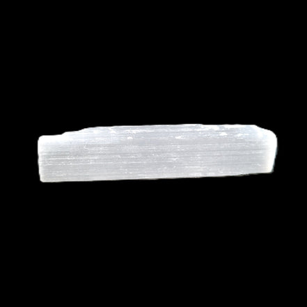 Selenite rod 55mm 7/9g in sunlight - Rocks and Things Store