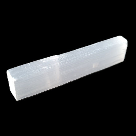 Selenite rod 55mm 7/9g in sunlight - Rocks and Things Store
