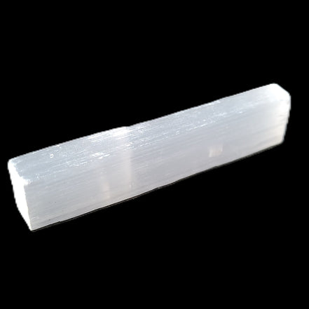 Selenite rod 55mm 7/9g in sunlight - Rocks and Things Store