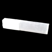 Selenite rod 55mm 7/9g in sunlight - Rocks and Things Store