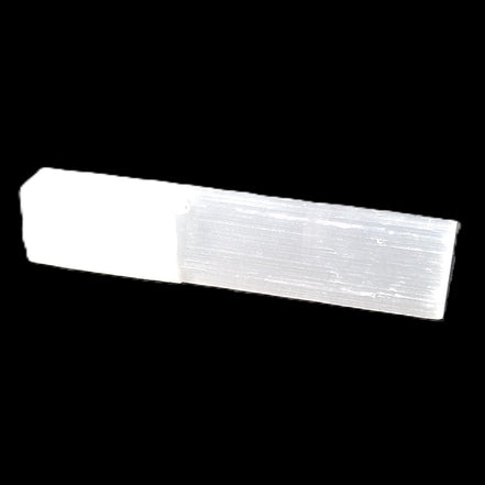 Selenite rod 55mm 7/9g in sunlight - Rocks and Things Store