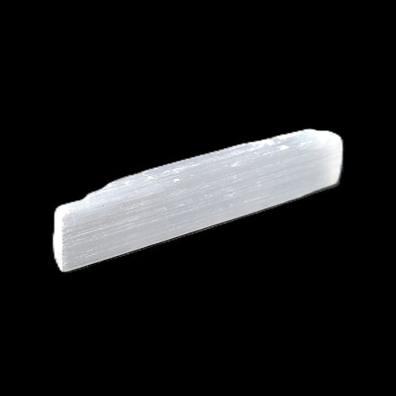 Selenite rod 55mm 7/9g in sunlight - Rocks and Things Store