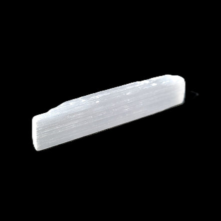 Selenite rod 55mm 7/9g in sunlight - Rocks and Things Store
