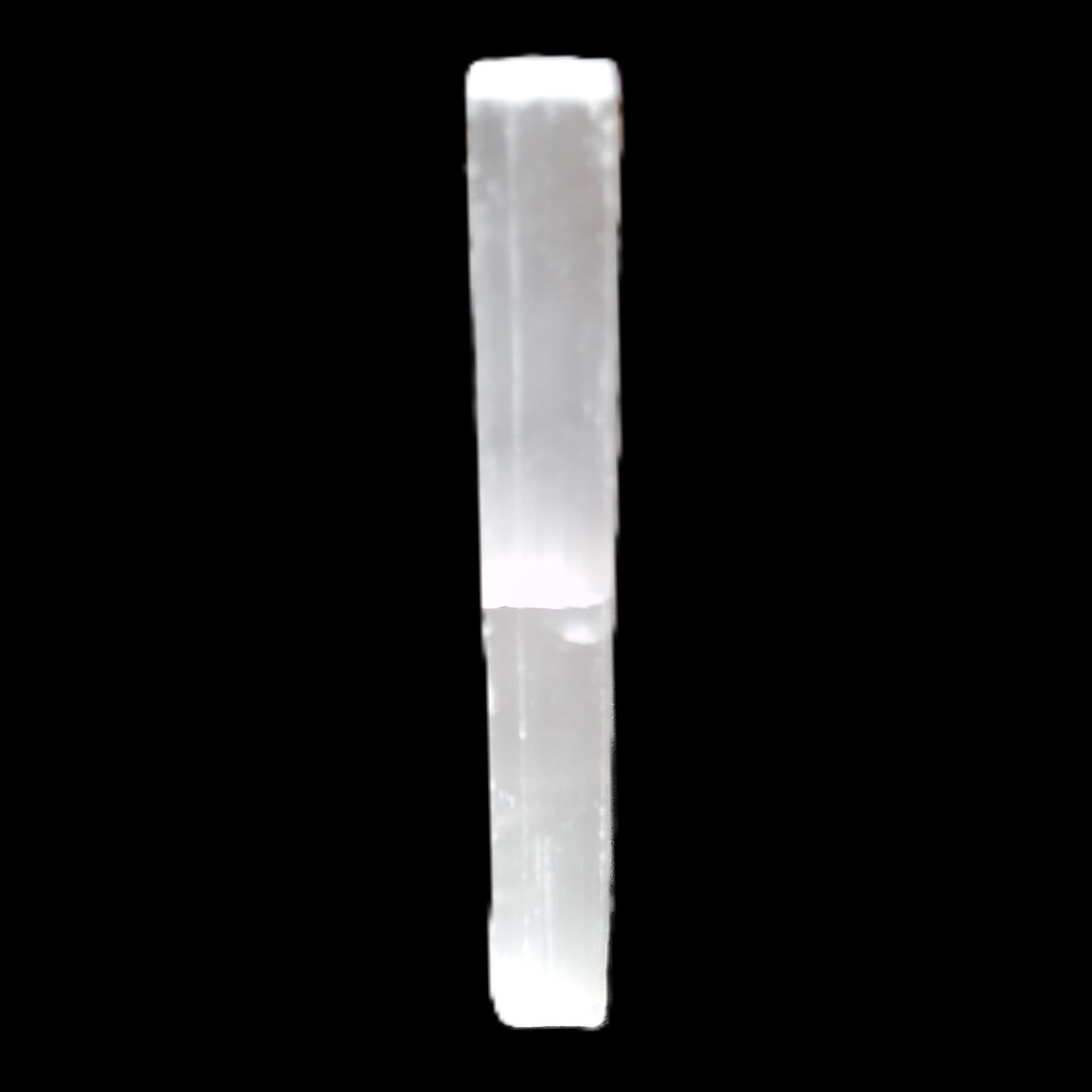 Selenite rod 83*9*9mm 17g in sunlight - Rocks and Things Store