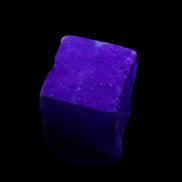 Sapphire cube from Sri Lanka (dyed) 24mm 141ct in UV light - Rocks and Things Store