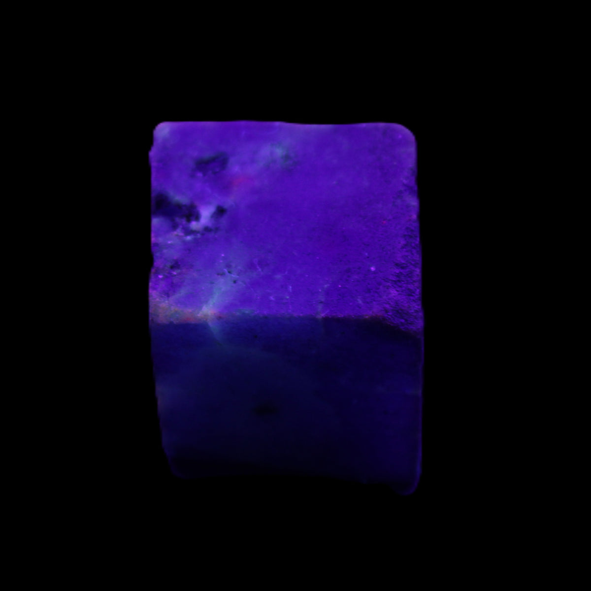 Sapphire cube from Sri Lanka (dyed) 24mm 141ct in UV light - Rocks and Things Store