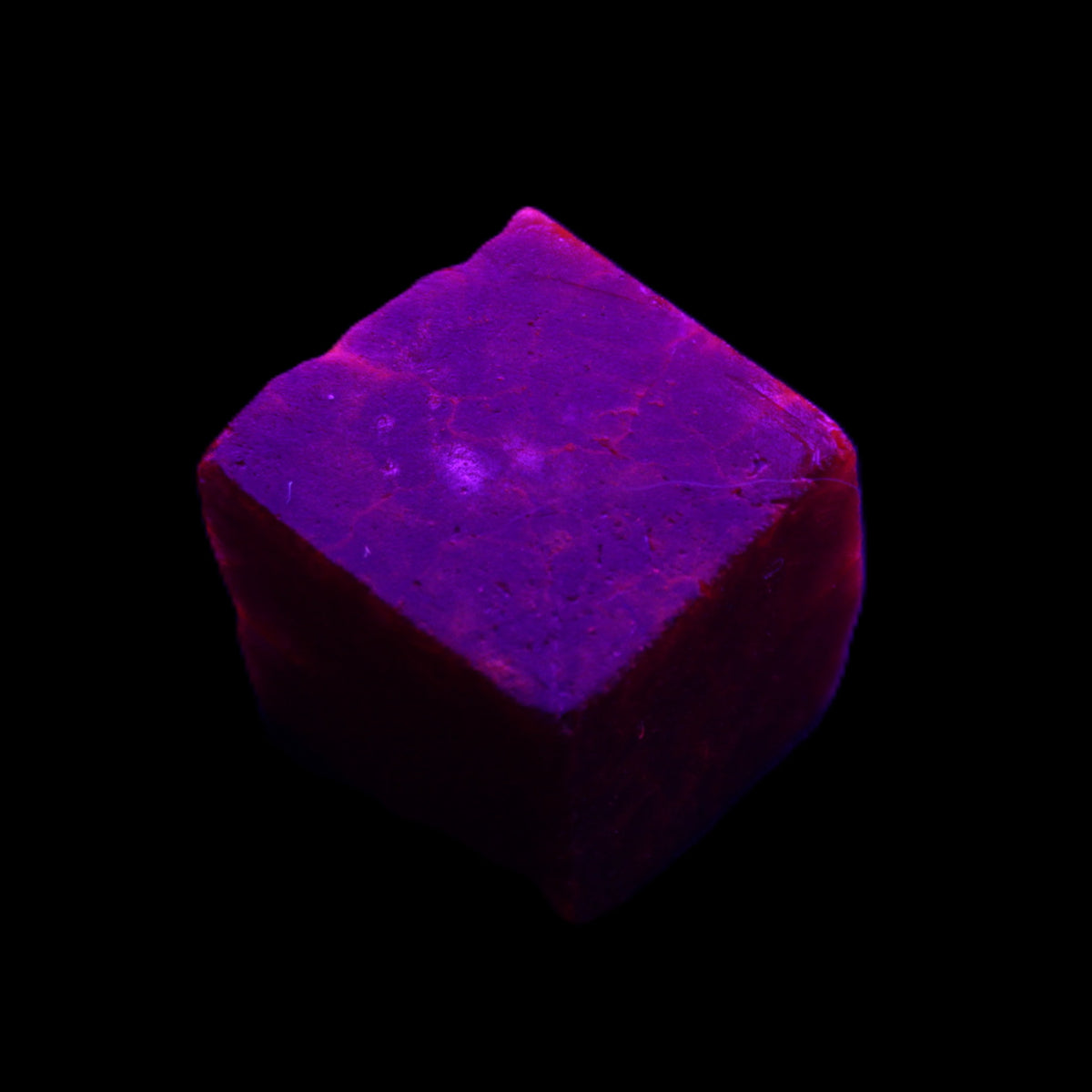 Ruby cube from Mynamar (dyed) 26*25mm 120ct 24g in UV light - Rocks and Things Store