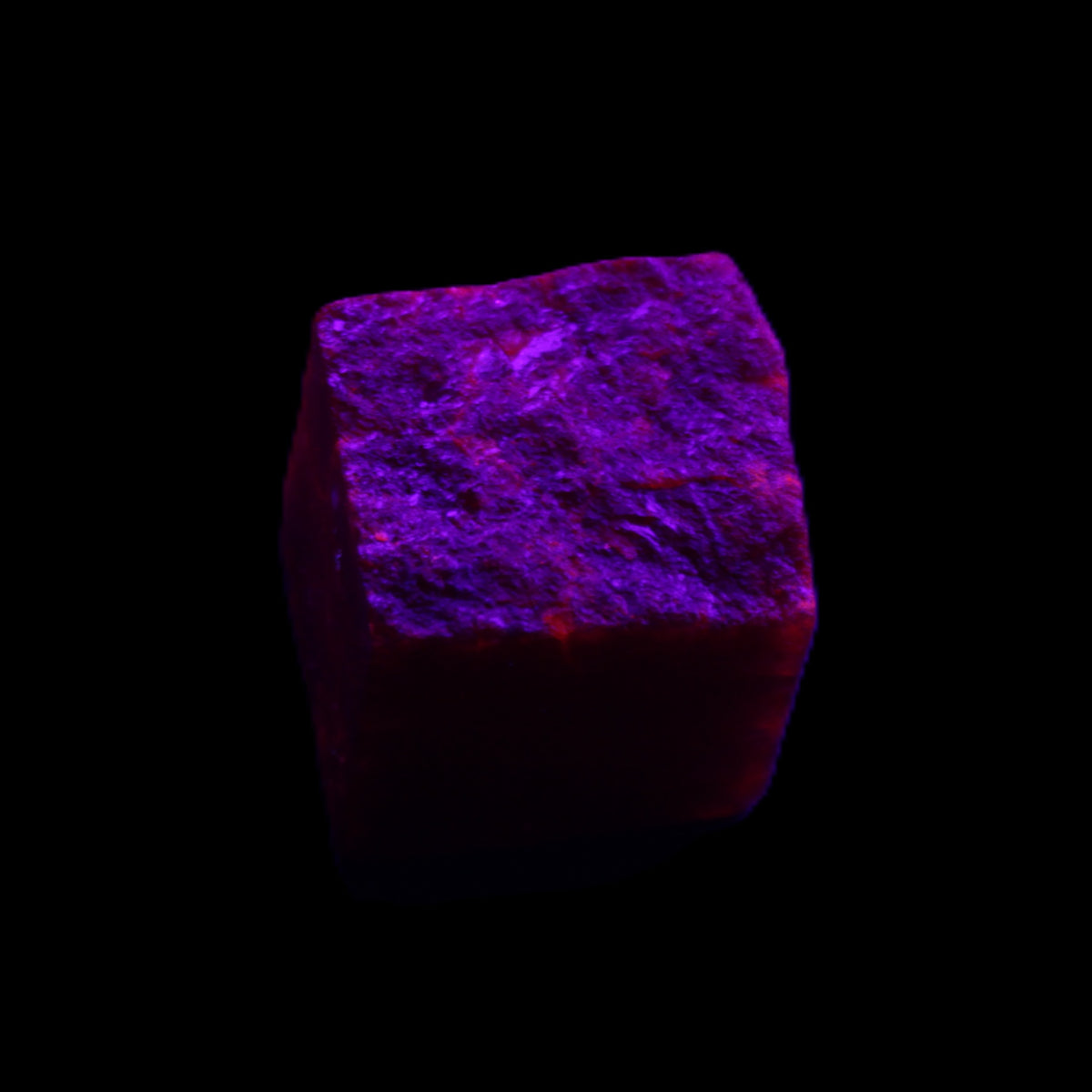 Ruby cube from Mynamar (dyed) 26*25mm 120ct 24g in UV light - Rocks and Things Store
