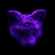 Yooperlite hand-carved Cat head 50*49mm 115g in UV light - Rocks and Things Store