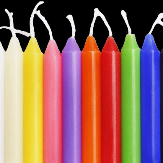 100 Mini Coloured Chime Spell Candles 10.2cm unscented tapers by Velumina in sunlight - Rocks and Things Store