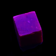 Ruby cube from Myanmar (dyed) 24*23mm 148ct 29.6g in UV light - Rocks and Things Store
