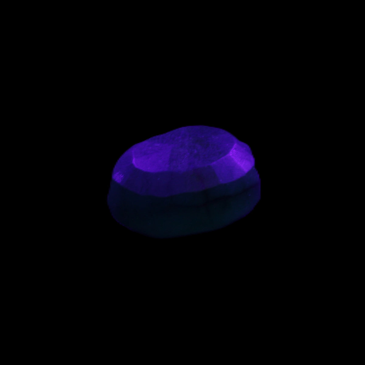Green Emerald Oval cut from Columbia 7m 11ct 2g in UV light - Rocks and Things Store