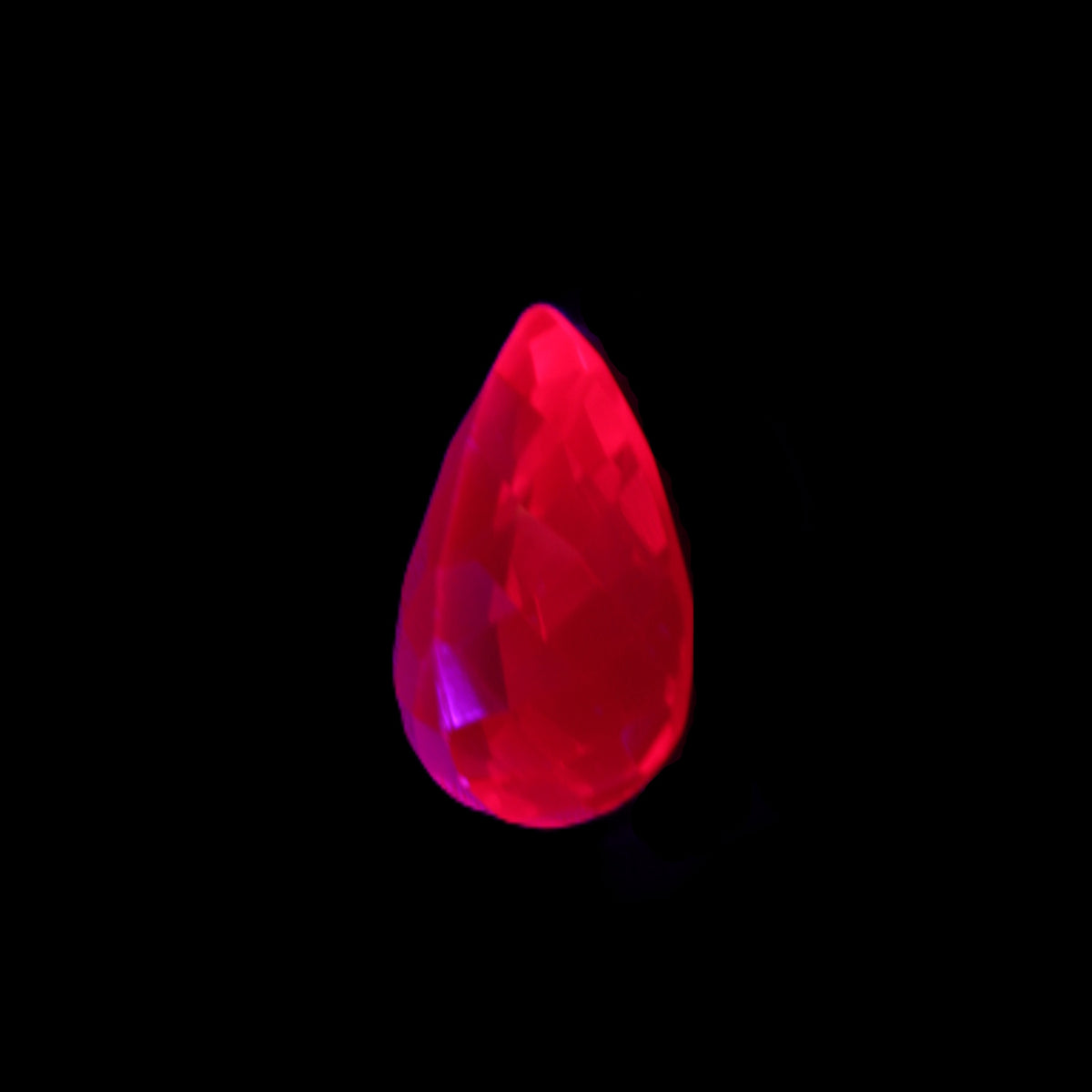 Red Ruby Pear cut from Mozambique 14*7*8mm 19.8ct 4g in UV light - Rocks and Things Store