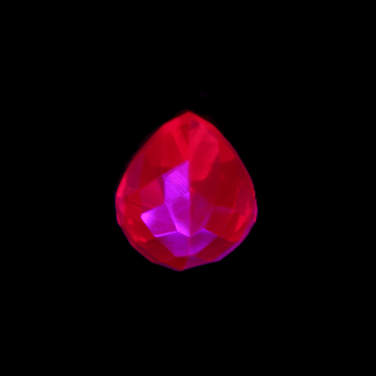 Red Ruby Pear cut from Mozambique 14*7*8mm 19.8ct 4g in UV light - Rocks and Things Store