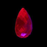 Red Ruby Pear cut from Mozambique 14*7*8mm 19.8ct 4g in UV light - Rocks and Things Store