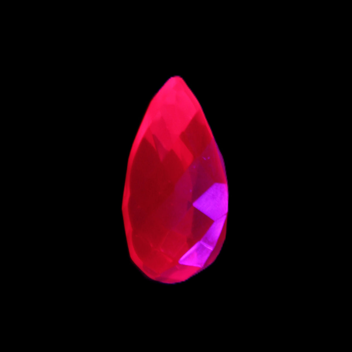 Red Ruby Pear cut from Mozambique 14*7*8mm 19.8ct 4g in UV light - Rocks and Things Store