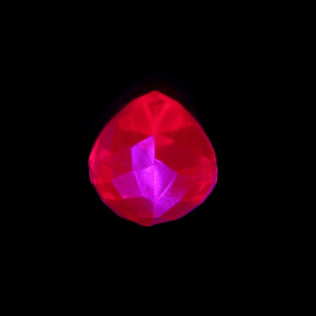 Red Ruby Pear cut from Mozambique 14*7*8mm 19.8ct 4g in UV light - Rocks and Things Store