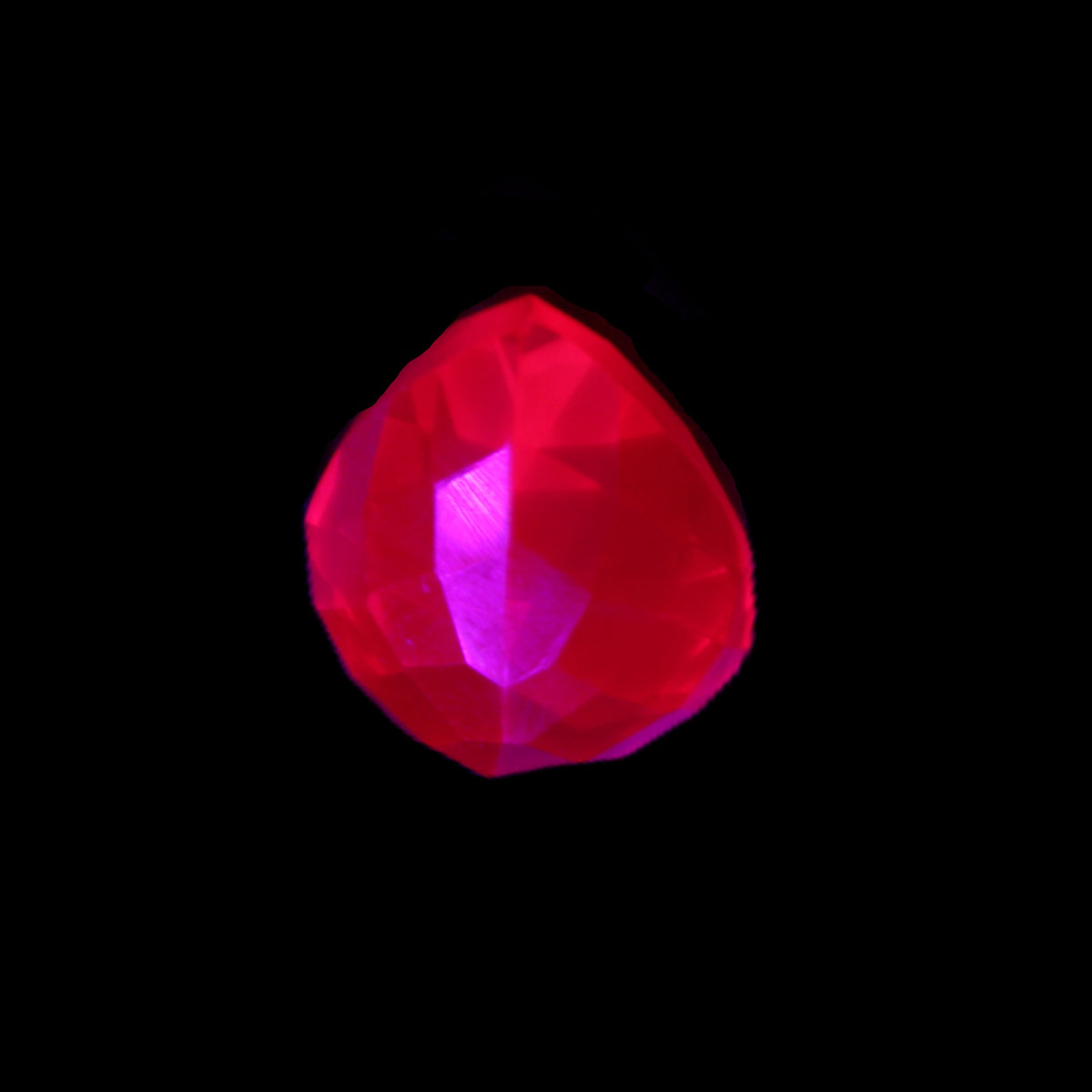 Red Ruby Pear cut from Mozambique 14*7*8mm 19.8ct 4g in UV light - Rocks and Things Store