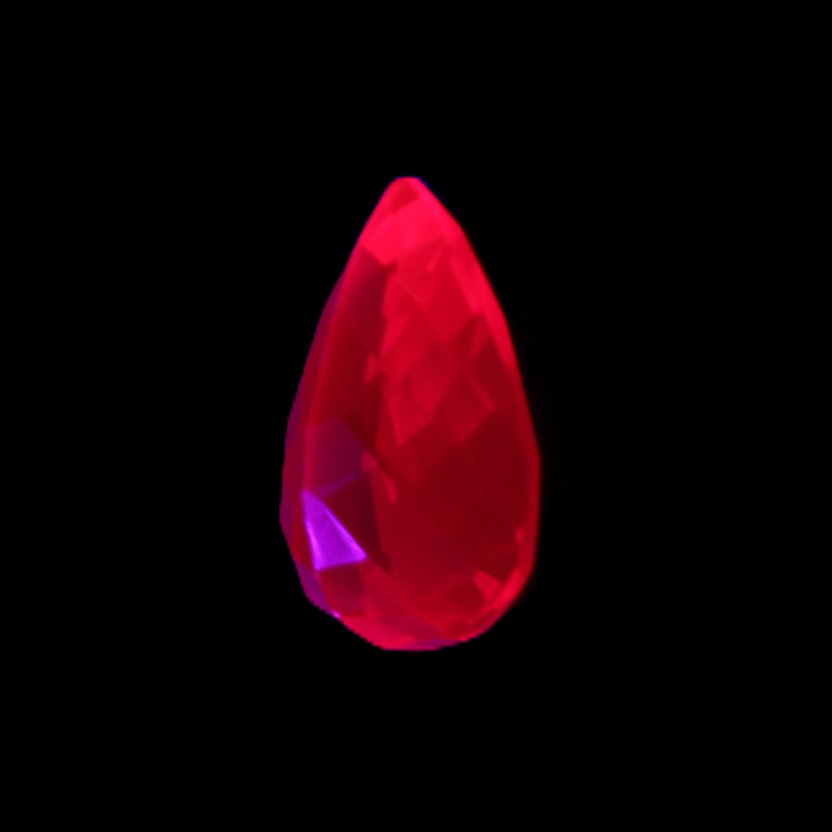 Red Ruby Pear cut from Mozambique 14*7*8mm 19.8ct 4g in UV light - Rocks and Things Store