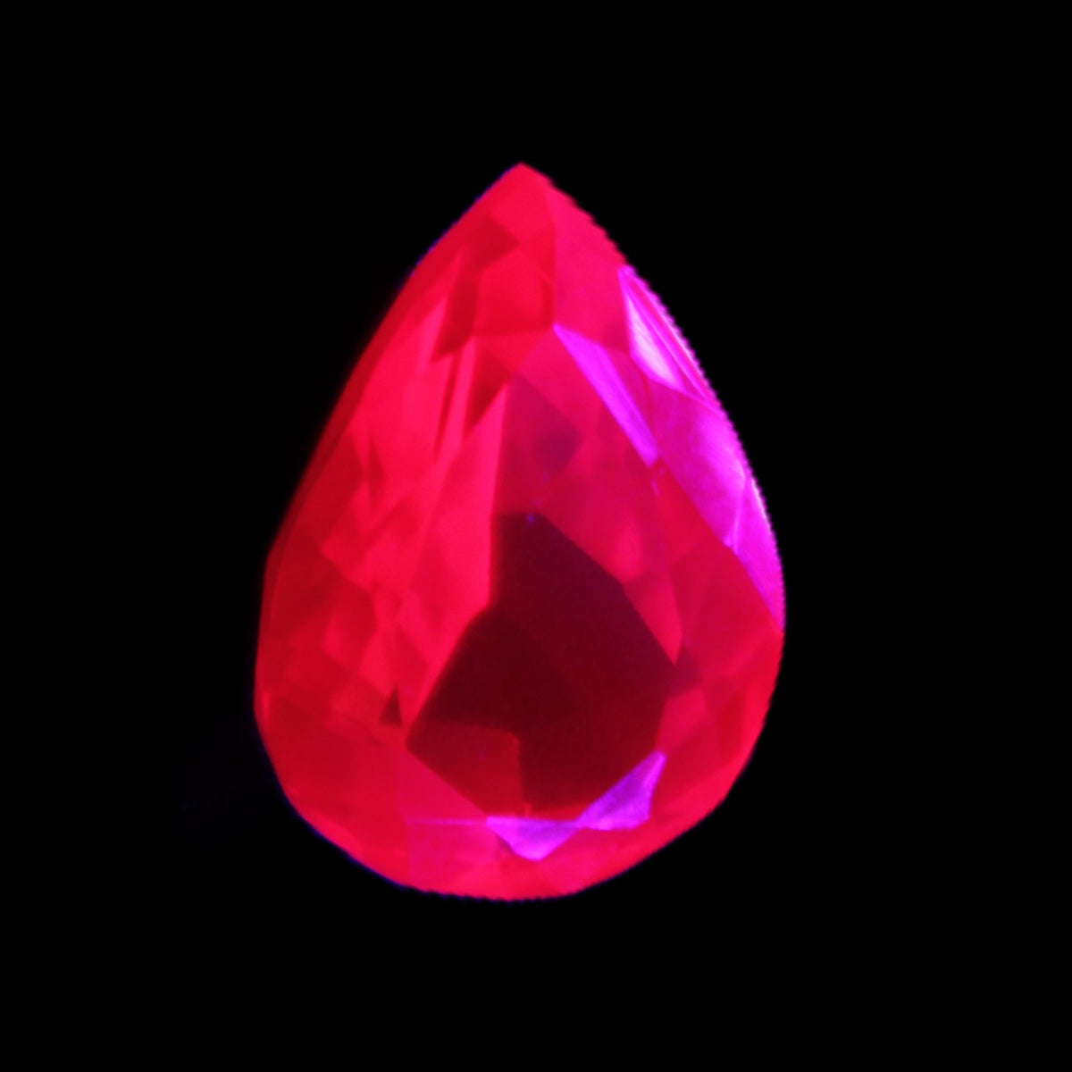 Red Ruby Pear cut from Mozambique 14*7*8mm 19.8ct 4g in UV light - Rocks and Things Store