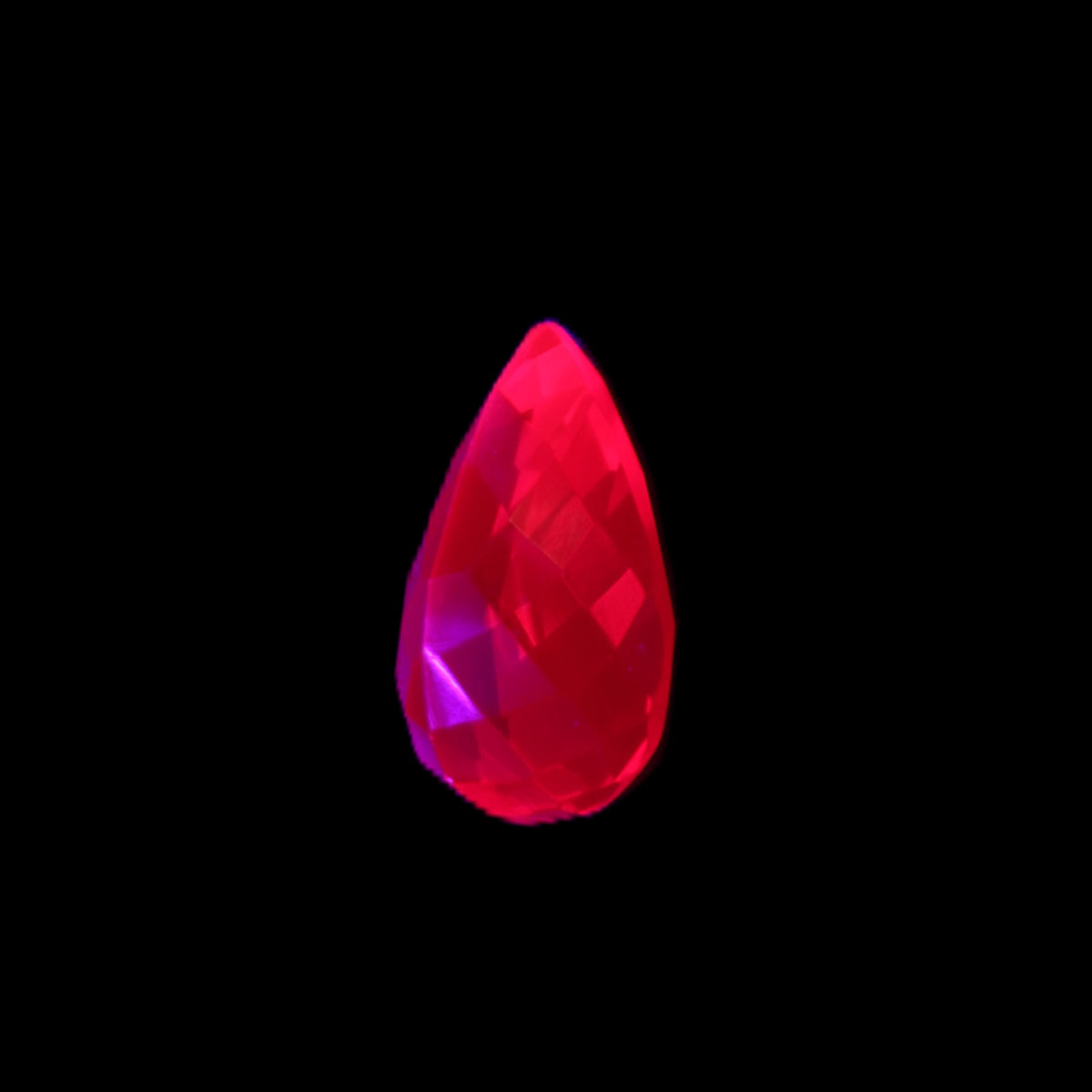 Red Ruby Pear cut from Mozambique 14*7*8mm 19.8ct 4g in UV light - Rocks and Things Store