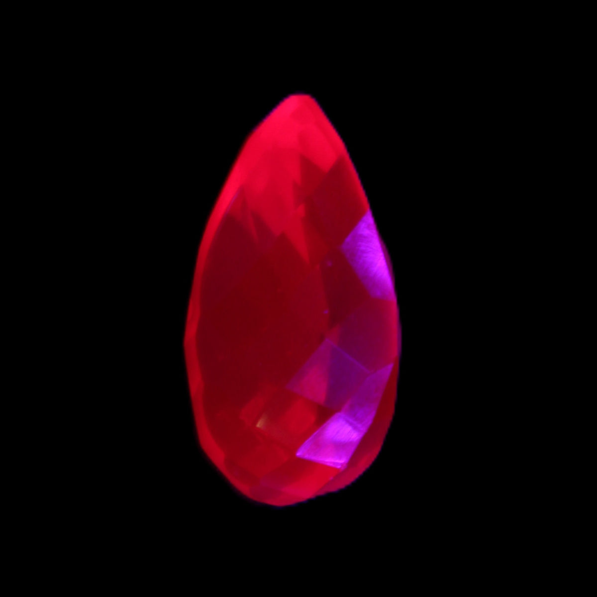 Red Ruby Pear cut from Mozambique 14*7*8mm 19.8ct 4g in UV light - Rocks and Things Store