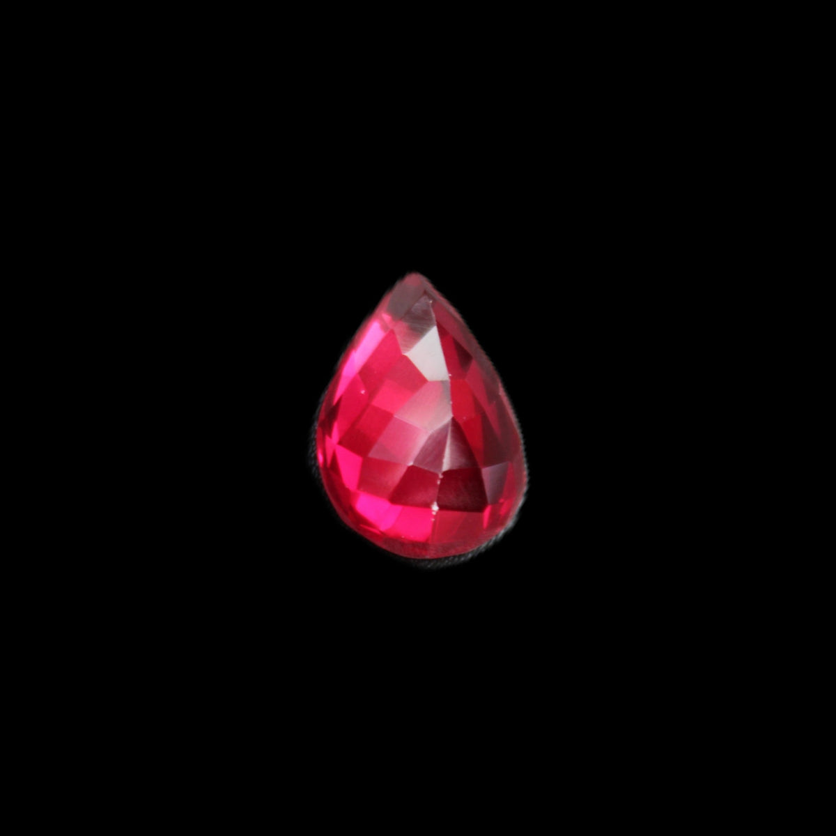 Red Ruby Pear cut from Mozambique 14*7*8mm 19.8ct 4g in sunlight - Rocks and Things Store
