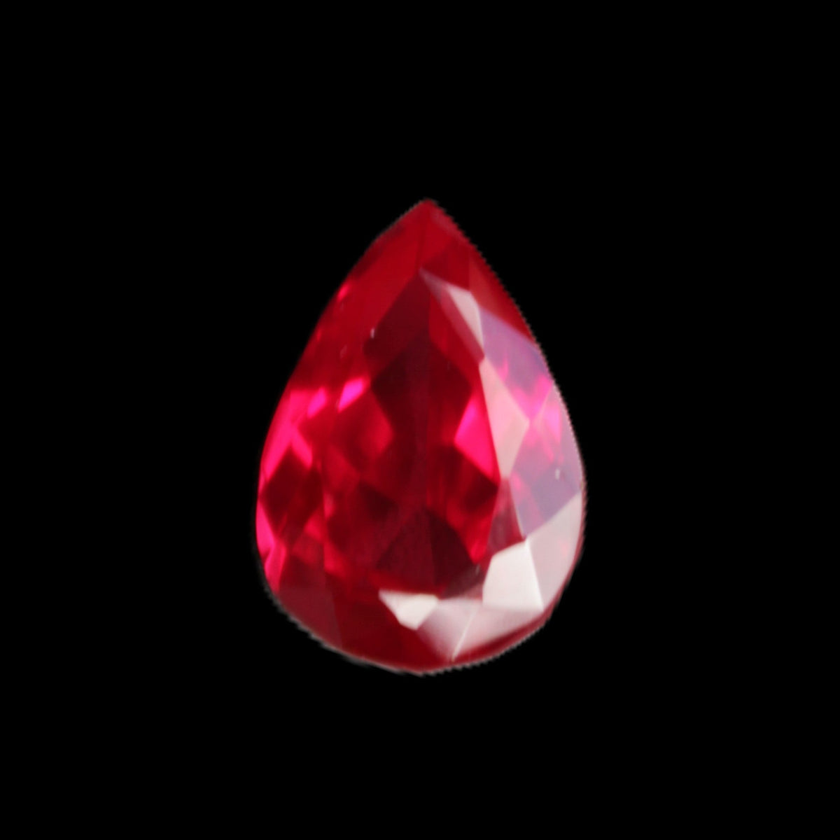 Red Ruby Pear cut from Mozambique 14*7*8mm 19.8ct 4g in sunlight - Rocks and Things Store