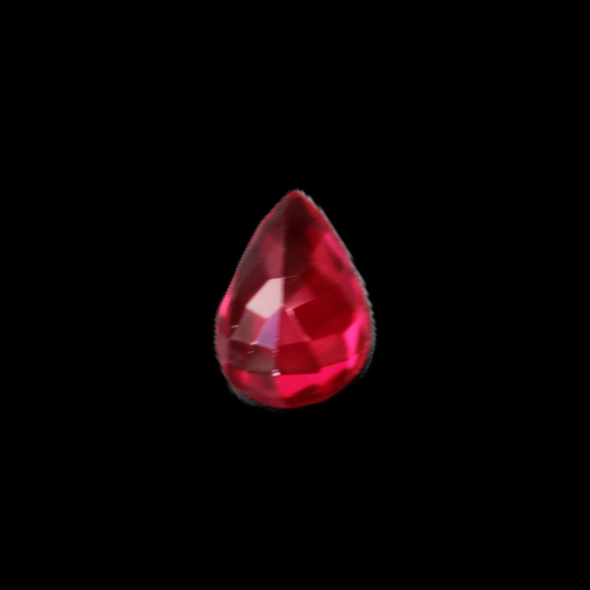 Red Ruby Pear cut from Mozambique 14*7*8mm 19.8ct 4g in sunlight - Rocks and Things Store