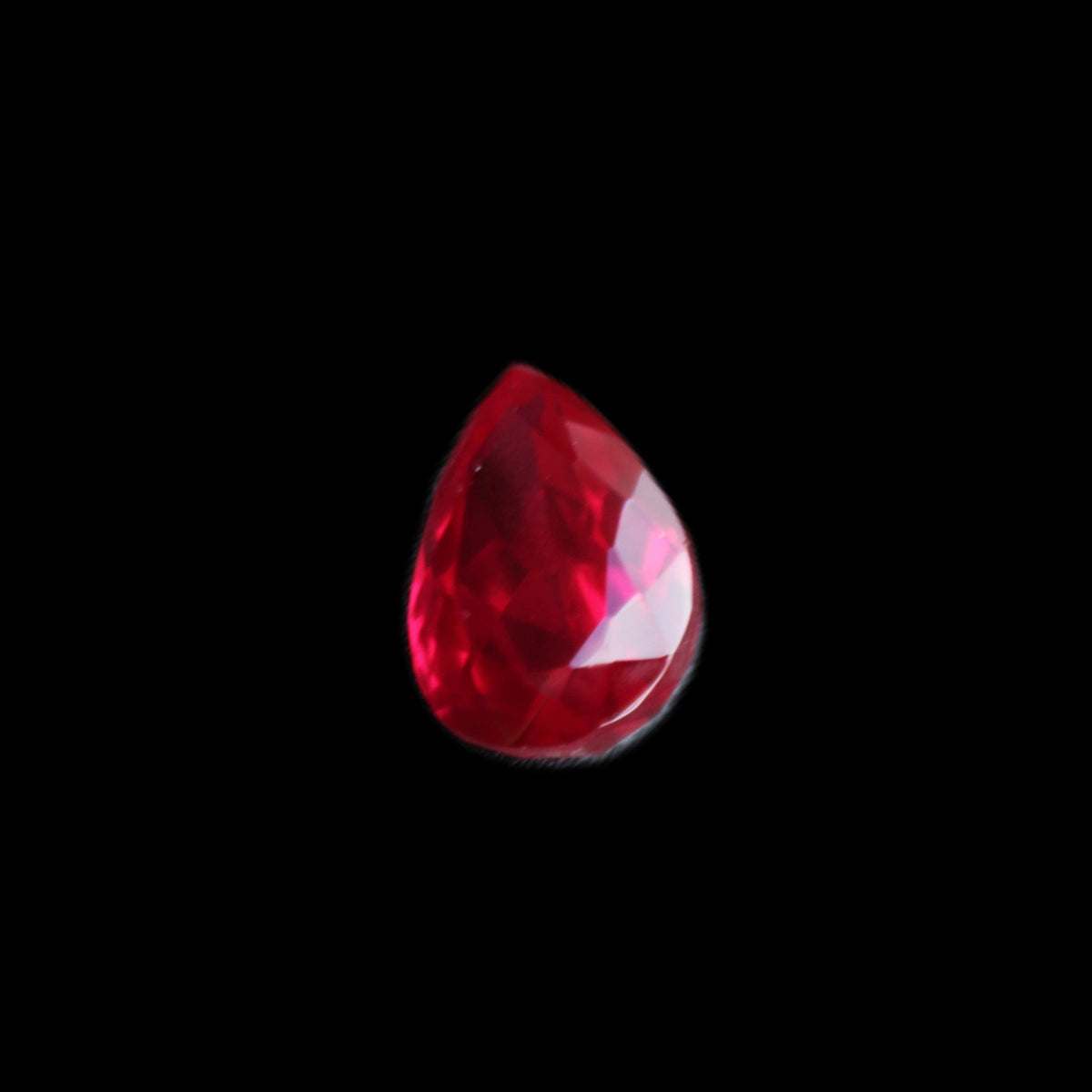 Red Ruby Pear cut from Mozambique 14*7*8mm 19.8ct 4g in sunlight - Rocks and Things Store