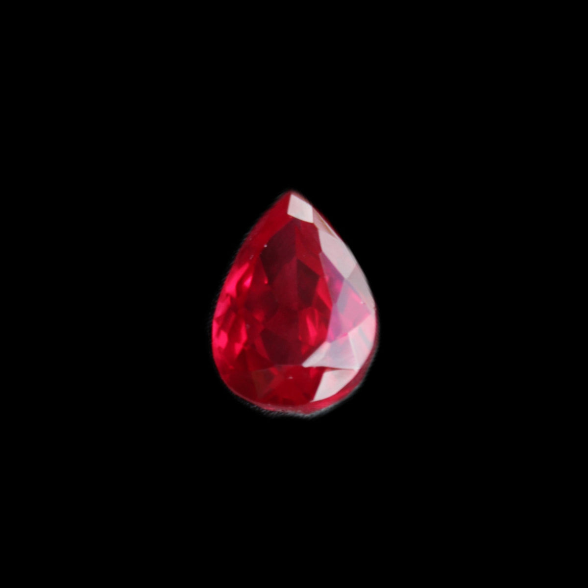 Red Ruby Pear cut from Mozambique 14*7*8mm 19.8ct 4g in sunlight - Rocks and Things Store