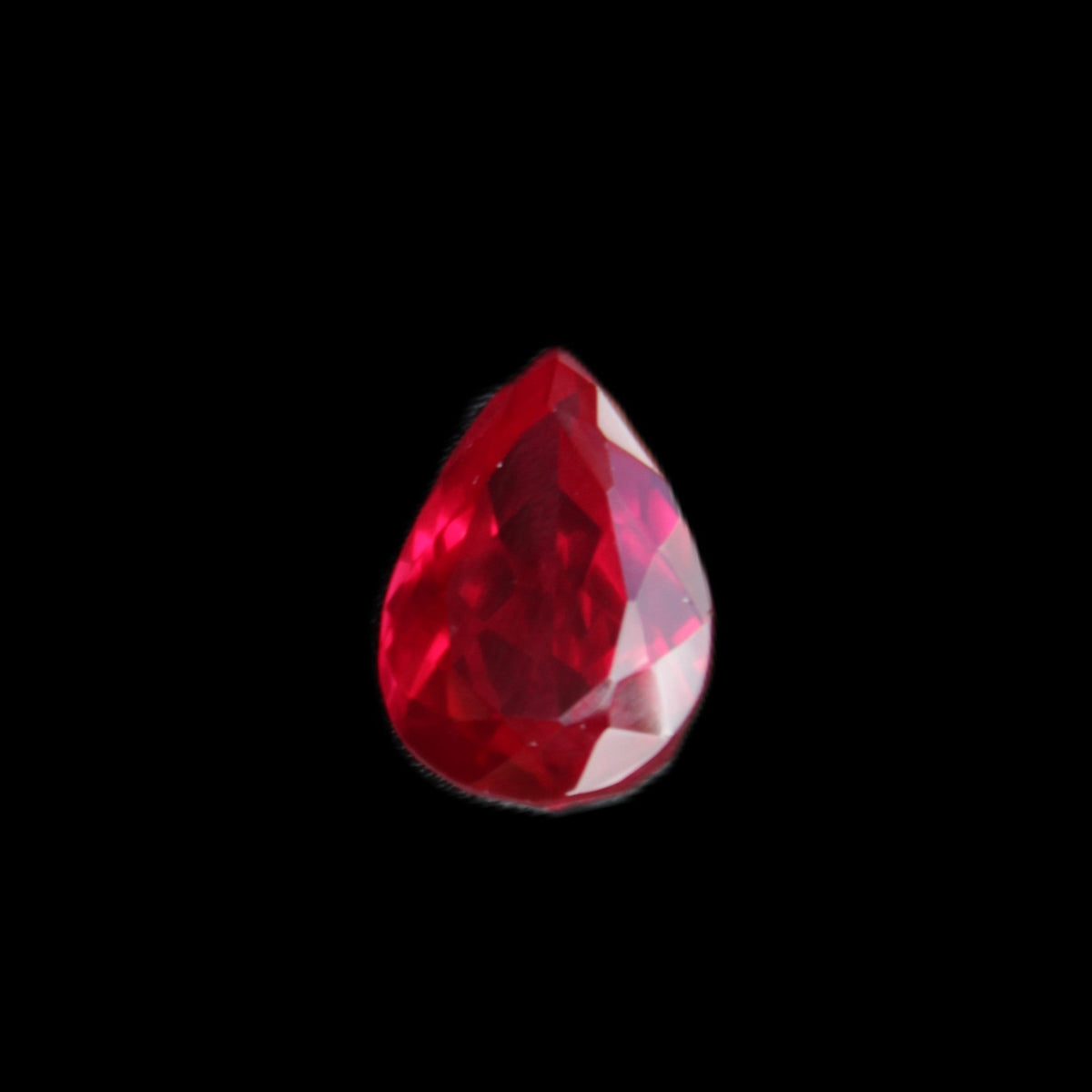 Red Ruby Pear cut from Mozambique 14*7*8mm 19.8ct 4g in sunlight - Rocks and Things Store