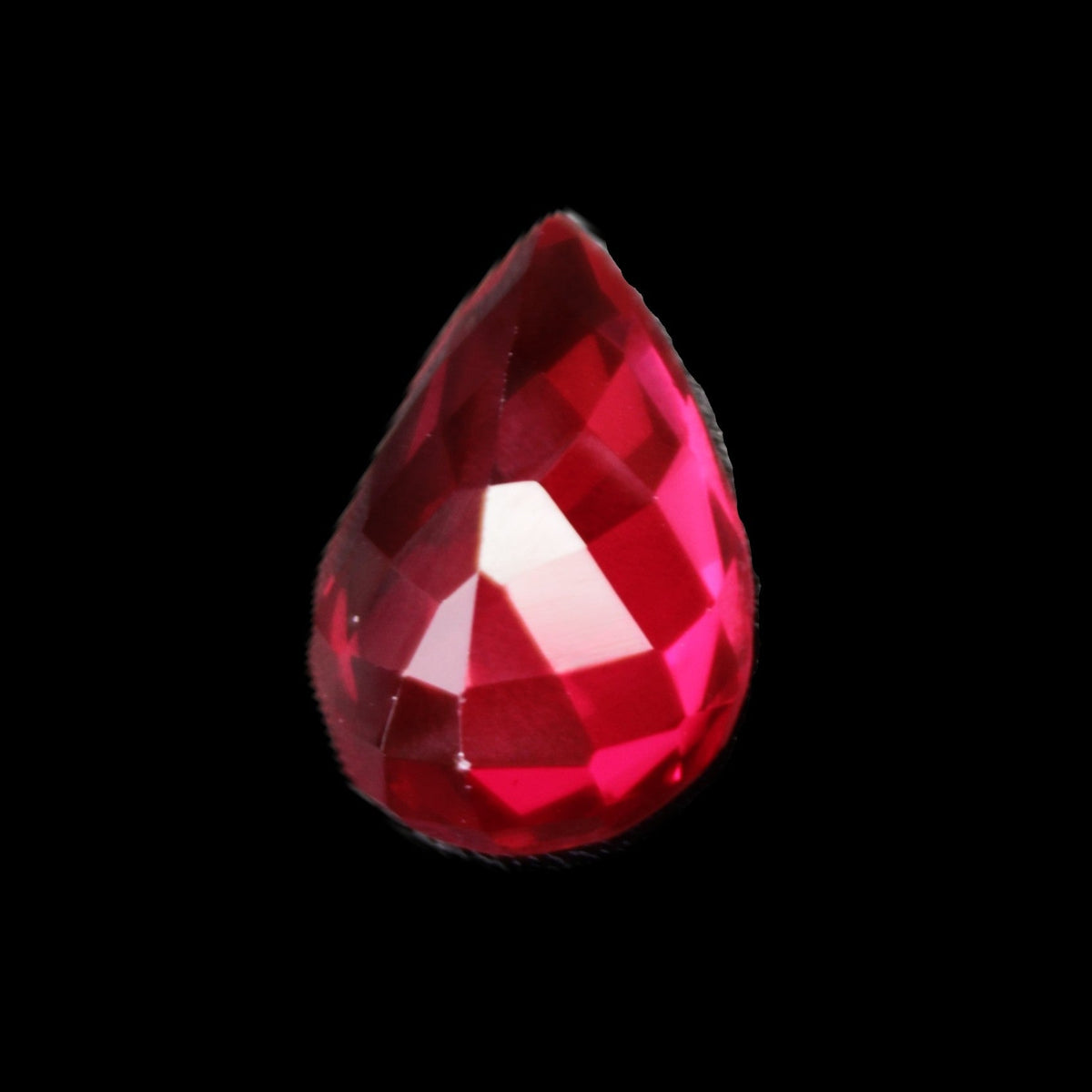 Red Ruby Pear cut from Mozambique 14*7*8mm 19.8ct 4g in sunlight - Rocks and Things Store