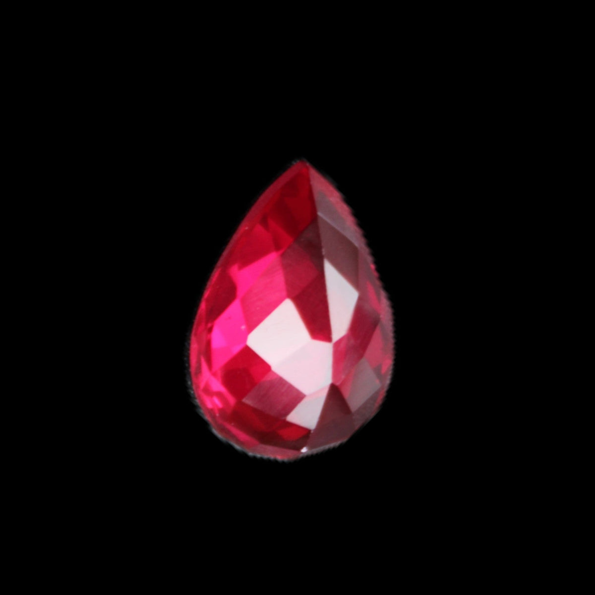 Red Ruby Pear cut from Mozambique 14*7*8mm 19.8ct 4g in sunlight - Rocks and Things Store