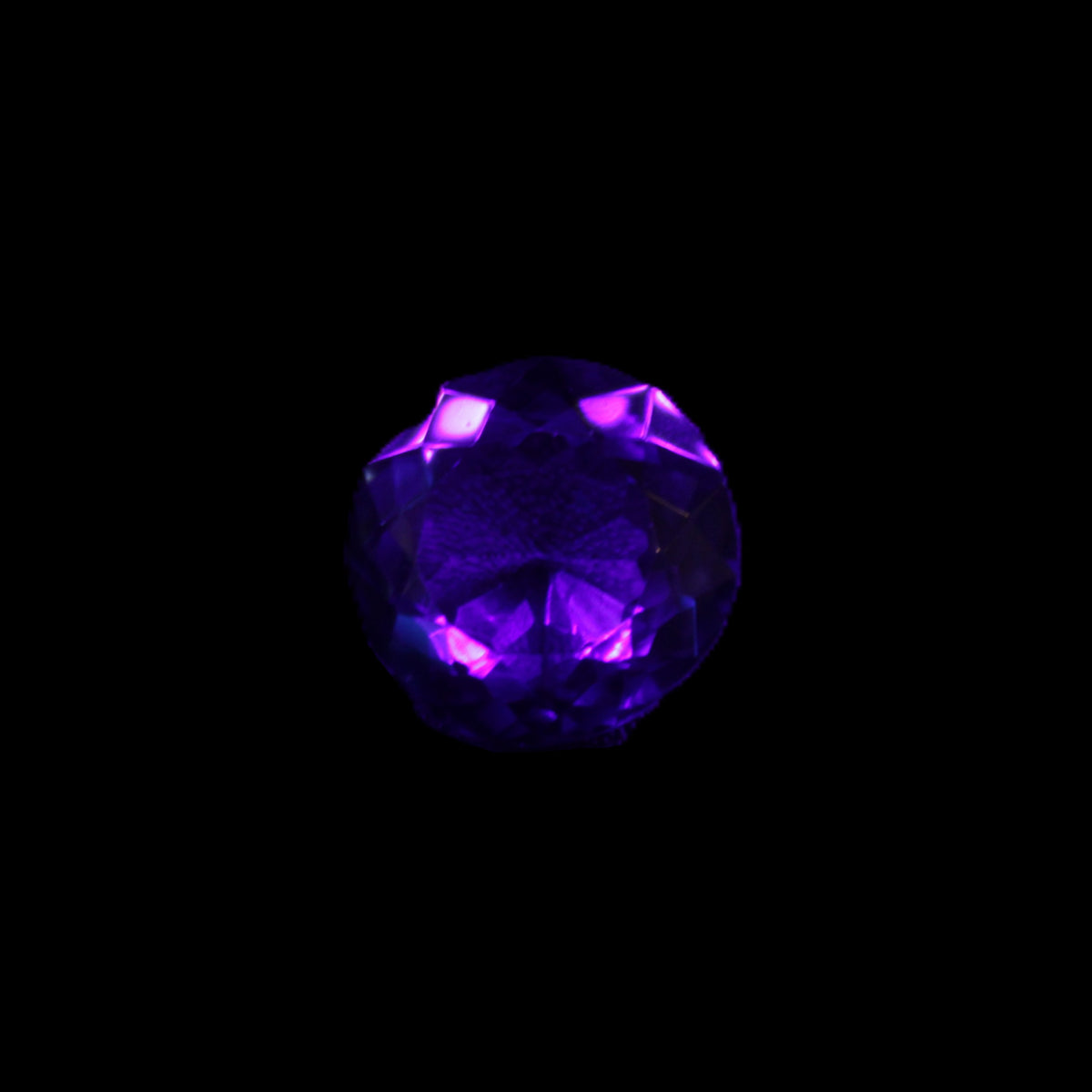 Blue Tanzanite round cut gemstone 11*8mm 7.95ct 1.8g in UV light - Rocks and Things Store