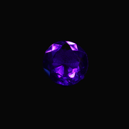 Blue Tanzanite round cut gemstone 11*8mm 7.95ct 1.8g in UV light - Rocks and Things Store
