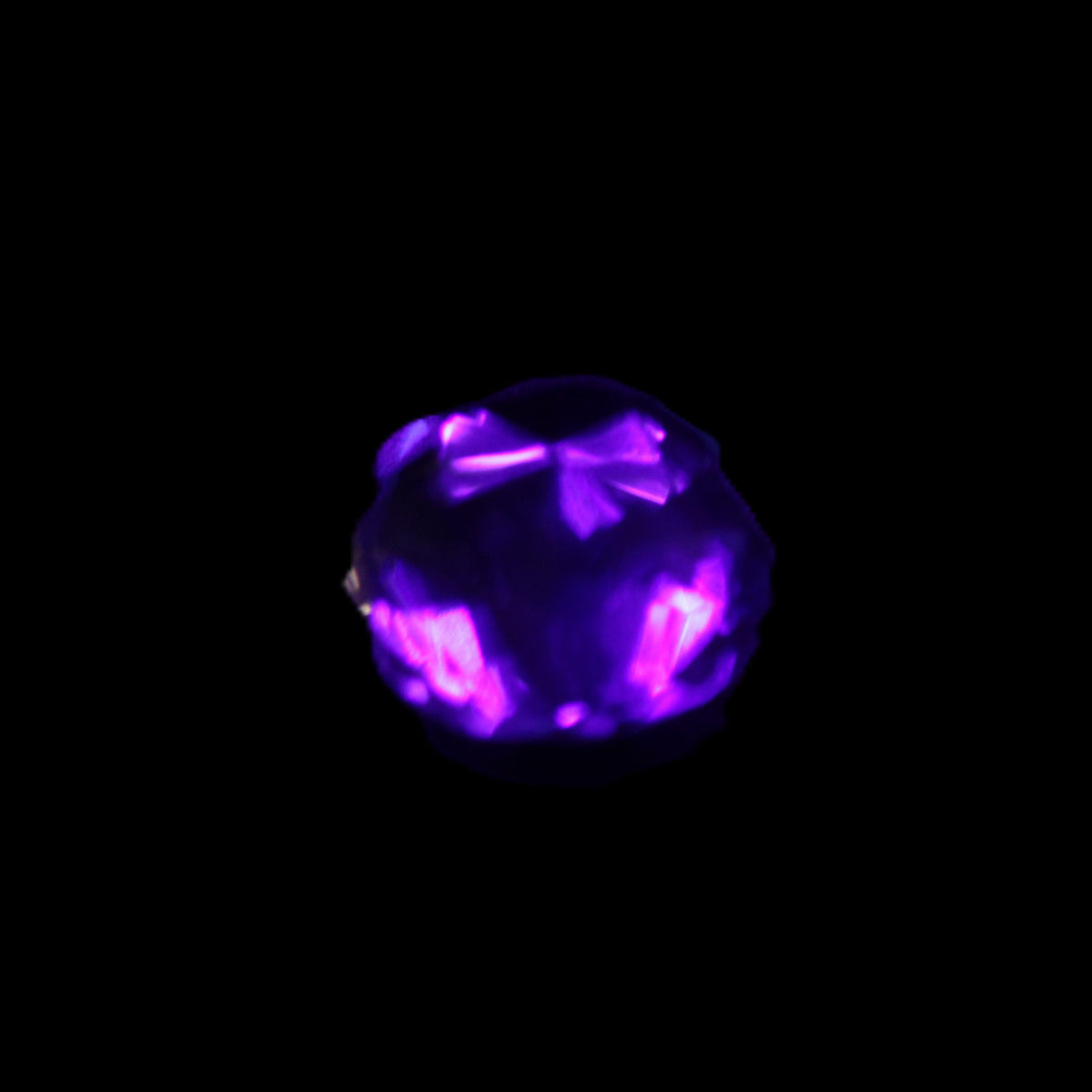 Blue Tanzanite round cut gemstone 11*8mm 7.95ct 1.8g in UV light - Rocks and Things Store