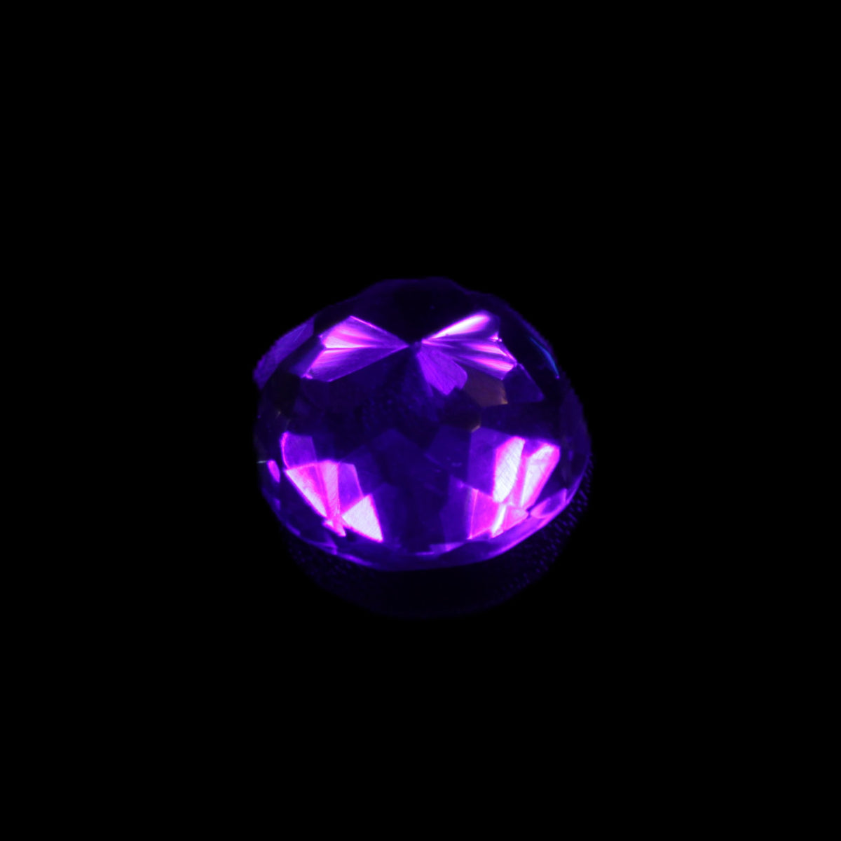 Blue Tanzanite round cut gemstone 11*8mm 7.95ct 1.8g in UV light - Rocks and Things Store