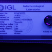 Blue Tanzanite round cut gemstone 11*8mm 7.95ct 1.8g in UV light - Rocks and Things Store