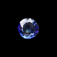 Blue Tanzanite round cut gemstone 11*8mm 7.95ct 1.8g in sunlight - Rocks and Things Store