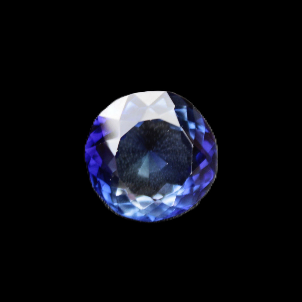 Blue Tanzanite round cut gemstone 11*8mm 7.95ct 1.8g in sunlight - Rocks and Things Store