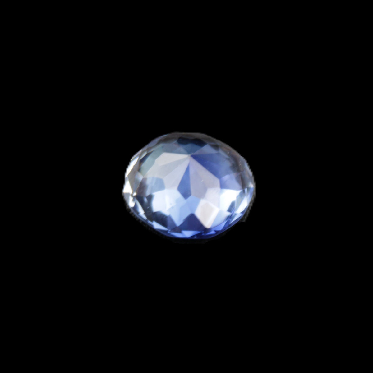 Blue Tanzanite round cut gemstone 11*8mm 7.95ct 1.8g in sunlight - Rocks and Things Store