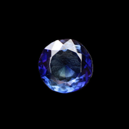 Blue Tanzanite round cut gemstone 11*8mm 7.95ct 1.8g in sunlight - Rocks and Things Store